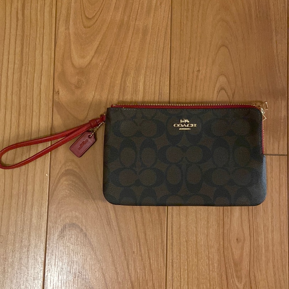 COACH Corner Zip Wallet in signature Canvas